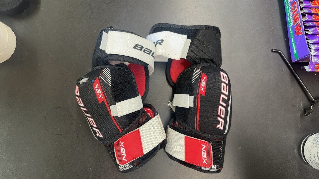 Bauer Hockey Elbow Pads NSX Senior Medium Used (small tear on the outside of one elbow) other than that in great shape