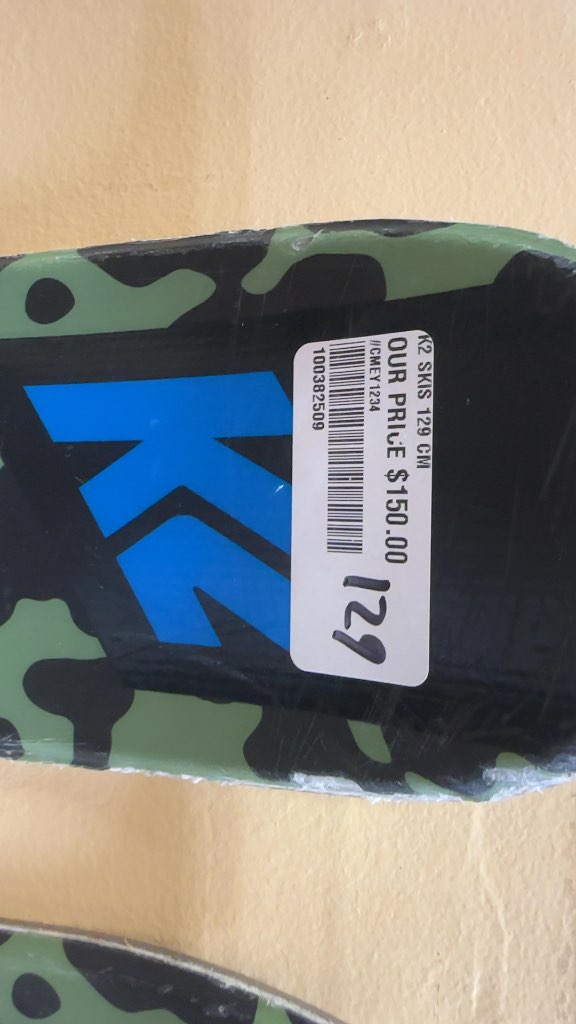 K2 Poacher Jr Skis with Marker 7.0 Bindings Used 129cm some rougher edges on the right side of both skis