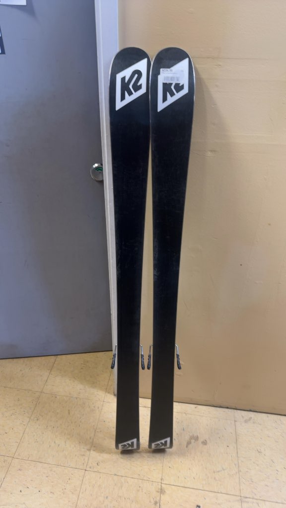 K2 Poacher Jr Skis with Marker 7.0 Bindings Used 129cm some rougher edges on the right side of both skis