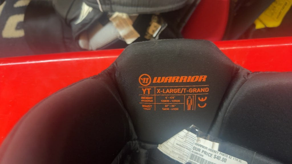 Warrior QRE-10 Hockey Pants Black Youth XL Used