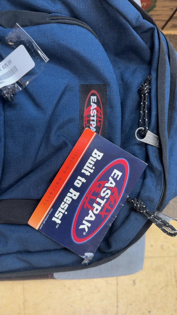 Eastpak Backpack Navy Blue CISM Patch Good Condition