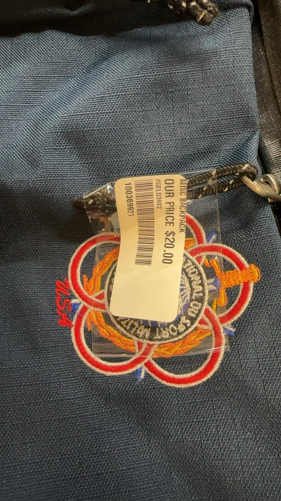 Eastpak Backpack Navy Blue CISM Patch Good Condition