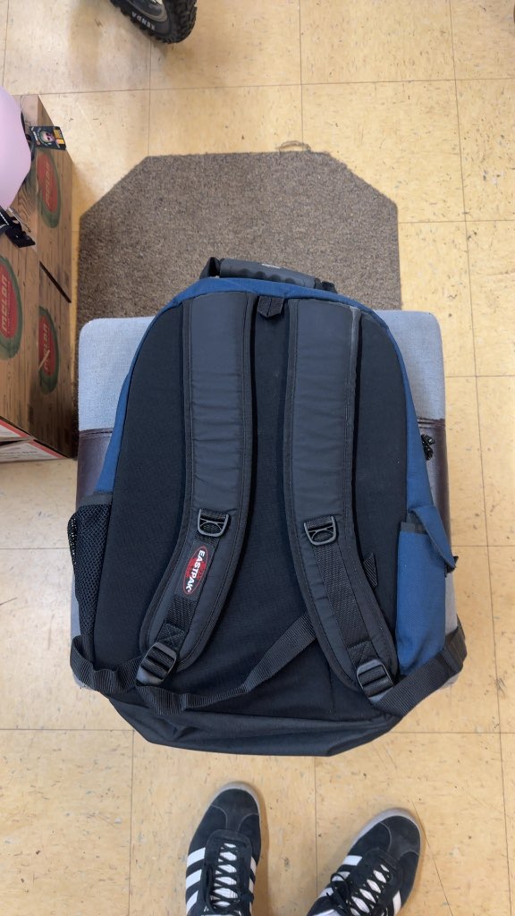Eastpak Backpack Navy Blue CISM Patch Good Condition